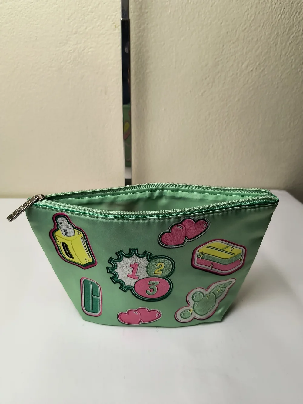 Clinique Mint Green Cosmetic Pouch with Yellow Patch